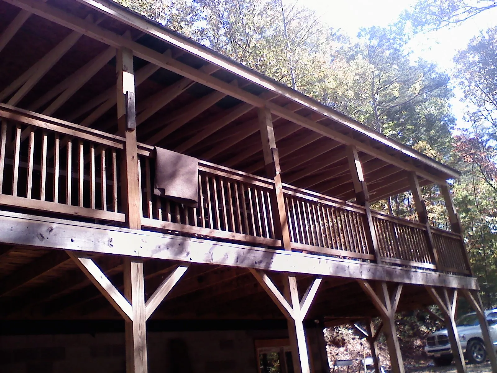 Timber framing under a new elevated porch and deck — Roof Leak Repair in Deer Creek by Roofing Brothers